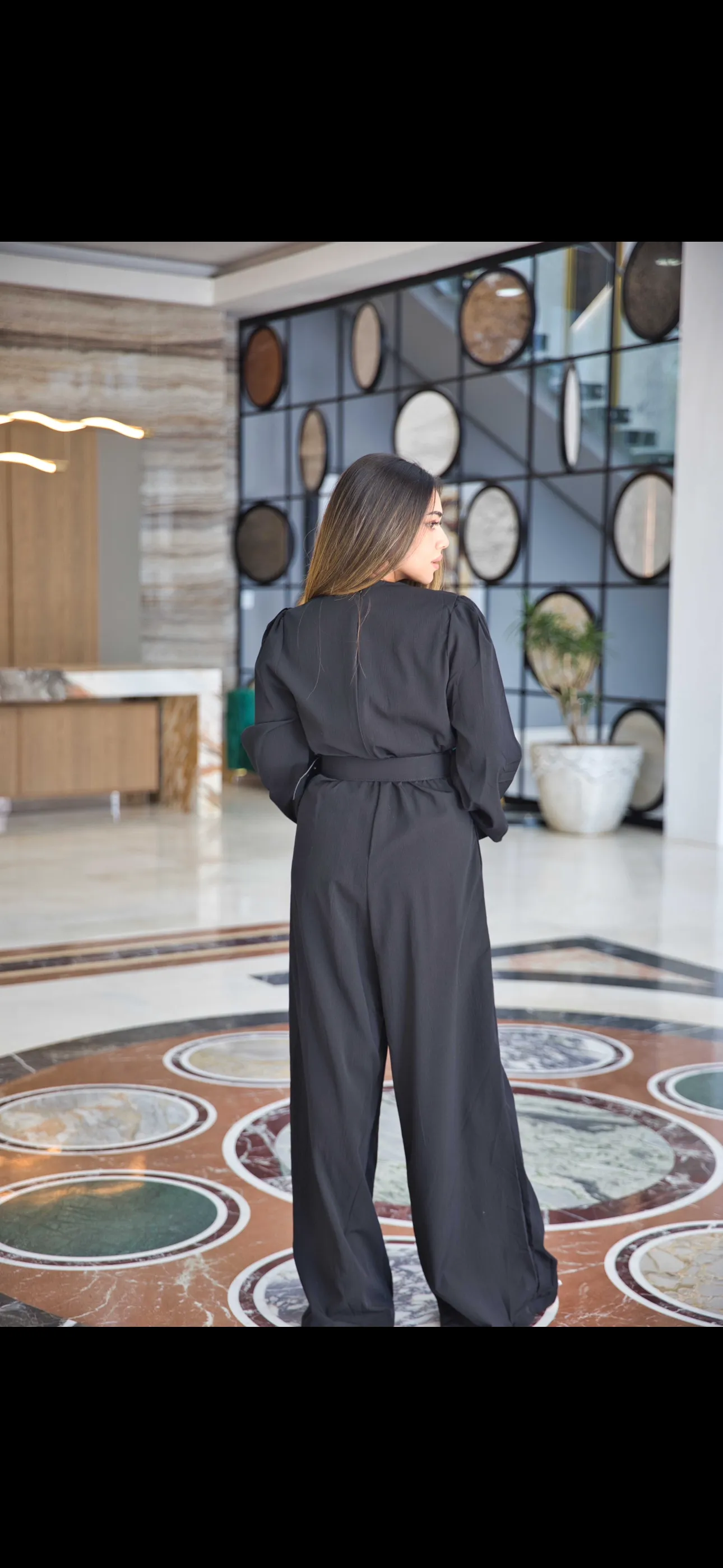 Black jumpsuit with belt